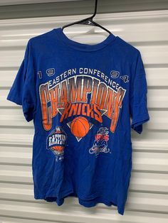 Vintage 90s New York Knicks 1994 Eastern Conference Champions NBA finals T-Shirt Men's Size Large Missing tag Fraternity Shirts Basketball, Vintage Sports T Shirt, 90s Vintage Tshirts, Cheap 90s Style Sports T-shirt, Throwback Basketball T-shirt For Sports Season, Vintage Basketball Tee, Throwback Basketball Crew Neck T-shirt, Throwback Basketball T-shirt With Crew Neck, Throwback Basketball T-shirt With Short Sleeves