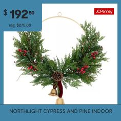 a christmas wreath with bells on it and the words, $ 92 99 reg $ 75 00