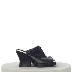 BOTTEGA VENETA WOMEN'S WEDGE MULE SANDALS IN BLACK LEATHER Retailprice: 1250$ Description Leather upper with kid suede sole Round toe Sculptural chunky heel Approx 110mm/ 4.25 inch heel Approx 40mm/ 1.5 inch platform Made in Italy Details Please choose from available sizes Black Leather New in box 100% Authentic — SHIPPING & HANDLING All purchases made are shipped with FEDEX Express International Priority. In order to satisfy our customers, we charge no extra costs at all for this service. Full track & trace is available for your purchase on Fedex's website. Tracking information will be mailed to the paypal email address used with your payment. If you do not receive this email, please check your spambox. The tracking number will also be added to your purchase on eBay. Please do note that w