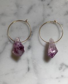 Raw amethyst brass hoop earrings.  Striking raw amethyst gemstone on delicate brass hoops. Purple Bohemian Everyday Jewelry, Handmade Minimalist Amethyst Jewelry, Minimalist Amethyst Jewelry For Jewelry Making, Nickel-free Purple Hoop Earrings, Purple Amethyst Hoop Jewelry, Purple Hoop Jewelry, Purple Small Hoop Jewelry For Gifts, Purple Hoop Jewelry For Gift, Purple Gemstone Hoop Earrings