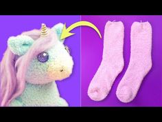 a stuffed unicorn is shown next to two pairs of socks