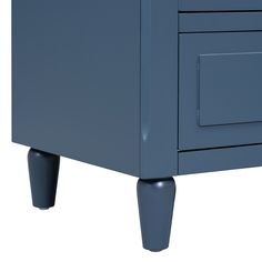 a blue cabinet with two drawers and one door