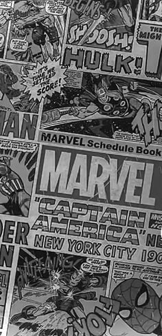 an assortment of comic books and stickers are on display in this black and white photo