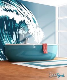 a bathroom with a large wave painted on the wall and a tub in front of it