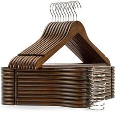 a stack of wooden clothes hangers stacked on top of each other