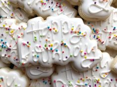 decorated cookies with white frosting and sprinkles