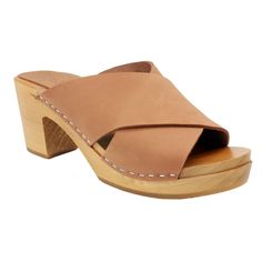 "The RIKKE from BJORK Swedish Comfort is a hand-made open back, open toe wooden clog slide sandal in soft cognac nubuck leather. * Hand Made in Europe * Soft Nubuck Leather * Adjustable strap * 2.75\" / 70mm heel and .75\" / 20mm platform * Genuine European wood outsole with rocker bottom to propel the foot forward * Outsole wood harvested from sustainable European forests ---> Ships in 1 business day ---Sizing Conversion EU     US Women's 35      5 36  5.5 - 6 37  6.5 38  7 - 7.5 39  8 - 8.5 40 Brown Suede Open Heel Clogs, Brown Suede Clogs For Summer, Suede Open Toe Mules With Wooden Heel, Suede Open Toe Clogs With Rubber Sole, Brown Suede Clogs With Stacked Heel, Leather Mules With Wooden Heel In Natural Color, Natural Leather Mules With Wooden Heel, Natural Leather Open Heel Mules, Brown Clogs With Heel Loop For Spring