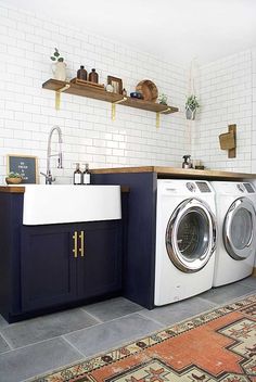 an instagramted photo of a washer and dryer in a kitchen