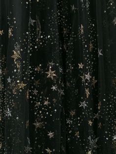 black sheer fabric with gold stars and sequins