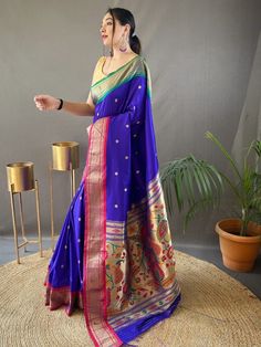 Wear this gorgeous blue paithani silk saree and experience the epitome of elegance and grace. Crafted with delicate zari weaving work and adorned with exquisite golden motifs all over, this silk saree is a true masterpiece. The rich pallu adds an extra touch of sophistication and luxury, making you stand out on any occasion.
The saree comes with a matching color silk fabric blouse that also features intricate zari weaving work, perfectly complementing the saree's design. Both the saree and the b Royal Blue Saree With Zari Weaving For Festivals, Blue Meenakari Saree For Navratri, Blue Paithani Silk Traditional Wear For Ceremonies, Blue Semi-stitched Paithani Silk Saree, Blue Paithani Silk Dupatta For Traditional Ceremonies, Royal Blue Zari Weaving Saree For Festivals, Blue Saree With Zari Weaving For Puja, Blue Zari Weaving Saree For Puja, Blue Meenakari Saree For Festivals