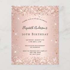 a pink and gold bridal shower card with glitter on the bottom, it is in front of a marble background