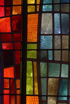 colorful stained glass panels are shown in this image