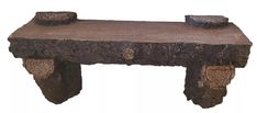 an old wooden bench with carved carvings on it's sides and two candles at the top