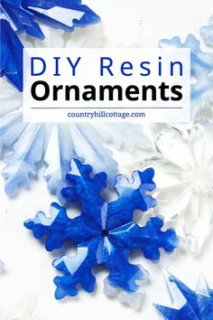 blue and white paper snowflakes with the words diy resinin ornaments