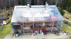 an aerial view of a house with a glass roof