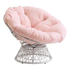 a pink chair sitting on top of a metal stand with a white pillow in it