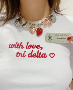 a woman wearing a t - shirt that says with love, ri delta