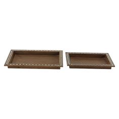 two wooden trays with beaded trim on each side and one holding an empty tray