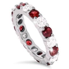 This women's ring features alternating rubies and diamonds.  The stones are set in solid 14k white gold. Anniversary Rings For Her, Sapphire Eternity Ring, Stackable Wedding Bands, Diamond Eternity Ring, Lady Dress, Blue Sapphire Diamond, Red Gemstones, Eternity Ring Diamond, Ruby Diamond