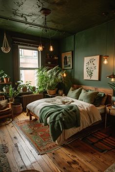 a bedroom with green walls, wooden floors and lots of plants in the window sill