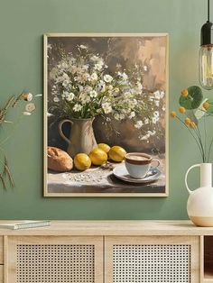 there is a painting on the wall with flowers and lemons