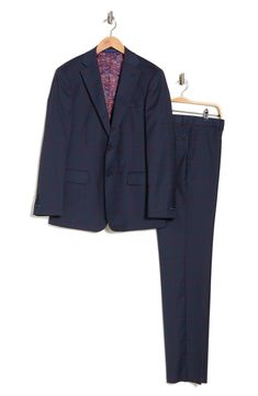 Make a dapper appearance at your next formal event in this clean-cut plaid suit that includes a peak lapel jacket and flat-front trousers. Jacket: 30.5" length (size 40R); trousers: 11" rise, 36" inseam (size 33W) Jacket has four-button cuffs; chest welt pocket; front flap pockets
 Trousers have zip fly closure; front pockets; back pockets
 Trousers have zip fly closure; front pockets; back pockets Shell: 82% polyester, 15% rayon, 3% spandex Lining: 100% polyester Dry clean Imported Model stats: Tailored Plaid Suit With Notch Lapel, Plaid Three-piece Suit With Notch Lapel For Formal Occasions, Plaid Semi-formal Suit, Plaid Suits For Semi-formal Occasions, Semi-formal Plaid Suit, Plaid Notch Lapel Suit For Business Casual, Semi-formal Plaid Suit With Notch Lapel, Plaid Suits With Notch Lapel And Welt Pockets, Plaid Notch Lapel Suit For Formal Occasions