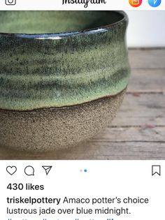 a green bowl sitting on top of a wooden table next to an instagram page