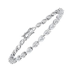 This diamond tennis bracelet features beautifully cut pear-shape diamonds set gorgeously in 18k white gold. Metal: 18k Gold Diamond Cut: Pear-Shape Natural Diamond Total Diamond Carats: 4.50cttw Diamond Clarity: VS Diamond Color: F-G Color: White Gold Bracelet Length: 7.5 inches Luxury Pear-shaped Brilliant Cut Tennis Bracelet, Luxury Pear-shaped Diamond Bracelet With Diamond Accents, Luxury Pear-shaped Diamond Bracelet With Accents, Luxury White Gold Pear-shaped Diamond Bracelet, White Gold Pear-shaped Diamond Bracelets, Luxury Pear-shaped Cubic Zirconia Diamond Bracelet, Pear-shaped Brilliant Cut Diamond Bracelet For Formal Occasions, Luxury Pear-shaped Cubic Zirconia Bracelet, Luxury Pear-shaped White Gold Diamond Bracelet