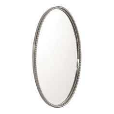 an oval mirror with beading around the edges