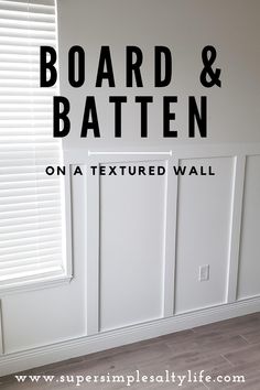 a white wall with black lettering that says board and batten on it