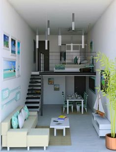 small kitchen designs in the living room and dining area with stairs leading up to the second floor