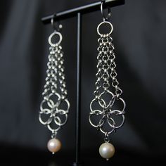 A modern interpretation of chainmaille techniques.  Length  earrings : 3.5 inches                                 9 cm Real colors may vary on different monitors. If you have any questions, then write to me. I will answer with pleasure. **PACKAGING** All jewelry comes in a handmade gift box so it arrives to you unharmed. Other jewelry in my shop: https://www.etsy.com/shop/SKYLARKartjewelry Follow me on instagram @skylark_eng Colors may be slightly different, depending on the display unit you are Chain Maille Earrings, Chain Maille Patterns, Chainmail Earrings, Blue Contacts, Pearls Earrings, Chain Maille Jewelry, Display Unit, Gothic Halloween, Earrings Christmas