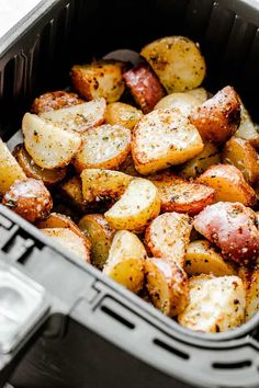 cooked potatoes with seasoning in an air fryer