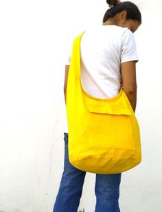 "This Beautiful Yellow color Bag This is a convenient very comfortable colorful bag and suitable for everyone. Yellow color Cross Body Shoulder Bag Top zipper closure with Front zipper pocket This bag is 100% cotton Measurements Size (Approx): Length: 15\" Height: 17\" Width: 7\" Strap Drop: 45\" Color : Yellow ** maybe dimensions will vary slightly** Please Visit our store: https://www.etsy.com/shop/Avivahandmade Thank You For Watching Diaper Bag, Shoulder Bag, Tote Bag, Messenger Bag, Purse, B Yellow Summer Shoulder Bag With Pockets, Yellow Bohemian Daily Use Bags, Eco-friendly Yellow Shoulder Bag For Everyday, Eco-friendly Yellow Shoulder Bag For Travel, Bohemian Yellow Shoulder Bag For Travel, Bohemian Bag, Ethnic Bag, Bohemian Bags, Colorful Bags