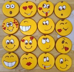 a bunch of yellow smiley faces with hearts on them