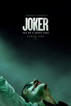 the joker movie poster with an evil looking man holding his hand up in the air