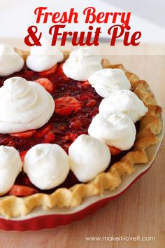 a strawberry pie with whipped cream on top