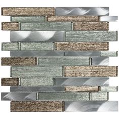 the back side of a glass and metal mosaic tile backsplash with metallic strips