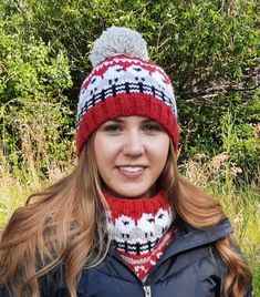 a woman wearing a red and white knitted hat