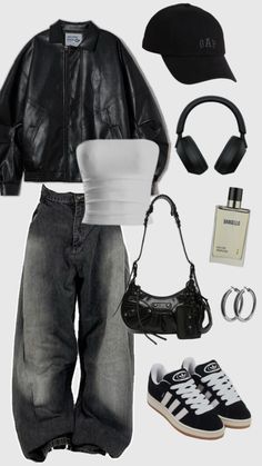 a black and white outfit with headphones, hat, purse, shoes and accessories