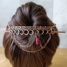 This loops hair slide is made with thick gauge solid copper wire wrapped and oxidized to emphasize all the details. I add some copper coated chain and a pink jade drop. A pop of color dangling with chains. The slide measures 10 cm x 1.4 cm/ 4 in x 0.5 in, the stick has 14 cm/ 5.5 in long. The barrette was carefully shaped and wrapped to give a great all day hold for most hair types. It can be bent to suit your style and volume of hair. Bending both the clip and the pin will give you maximum fit. How To Clean Silverware, Bun Holder, Hair Clasp, Pink Jade, Unique Hair, Half Updo, Hair Slide, Unique Hairstyles, Thick Hair