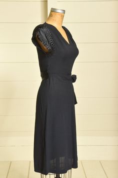 "1940s Rayon Deco Dress Silk Stitched Sleeves Belted Cocktail Dress Darling 1940s era rayon dress. Black rayon with silk detail stitched sleeves. Hidden Talon metal zipper to close the side. In good vintage condition, showing normal signs of wear. Measurements shoulders: free bust: 32\" waist: 27\" hips: 40\" length: 41\"" Retro Fitted Rayon Dresses, Fitted 1950s V-neck Dress, Fitted Vintage Rayon Dress, 1960s Hippie, Dolly Dress, Deco Dress, Dress Silk, Rayon Dress, Dress Out