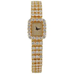 Piaget 18mm Diamond Halo Bracelet Watch in 18k Yellow Gold. A vintage Piaget watch with diamonds on the band and dial, mounted in yellow gold. The band features flexible bracelet links comprised of white round brilliant diamonds in three rows which graduate in size. Bezel is adorned with a halo of carefully calibrated diamonds of a similar carat weight. Minimal dial with rows of impeccably-set micro-pavé, no hour marks, and dauphine-style hands. Diamond carat weight approx. 20.00 carats total, D Halo Bracelet, Ladies Wrist Watch, Gold Bracelets Stacked, Gold Diamond Watches, Expensive Diamond, Flexible Bracelet, Amazing Watches, Diamond Quartz, Luxury Timepieces