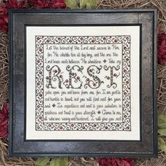 a cross stitch pattern with the words rosy on it and flowers in front of it