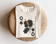 Black Girl Shirts. Nefertiti, Aminatu, Makeda, Cleopatra, Nandi, and You. Being a powerful black queen runs through your veins. This shirt is just the icing.  African Queen Card Relaxed Fit Tee. Direct to Garment Printing on T-shirt  Polyester/Cotton Mix Fabric weight: 4.2 oz (142 g/m2) Side-seamed Unisex Fit Ships in 3-5 business days *tshirt care. For best results, wash cold with mild detergent, inside out, and hang to dry.  Do Not Bleach. Do not iron on design.  Check out our personalized Que Queen Nefertiti Art, Queen Card, 2 Daughters, Queen Tee, Queen Black, Queen Shirts, Dropped Shoulder Sweatshirt, African Queen, Queen Hair