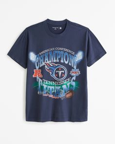 Show your team spirit in style with the Men's Tennessee Titans Graphic Tee from Abercrombie & Fitch. This dark blue tee is a must-have for any Titans fan.

- Size: Large
- Color: Dark Blue
- Material: Cotton
- Gender: Male
- Features: Short sleeves, relaxed-fit silhouette, crew neckline
- Design: Tennessee Titans-inspired graphic detail at chest

Crafted in our exclusive softAF fabric, this tee combines comfort with casual elegance, making it perfect for game day or any day. Whether you're cheer Relaxed Fit Game Day Graphic T-shirt, Game Day Relaxed Fit Graphic T-shirt, Dark Blue Shirt, Neckline Designs, Men's Tops, Tennessee Titans, Silhouette Crafts, Blue Tee, Buffalo Bills