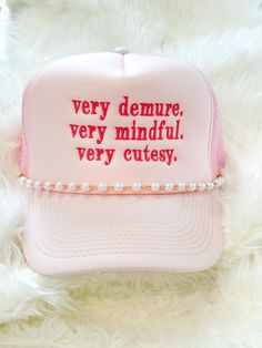 a pink trucker hat with the words very demure, very mindful, very cute