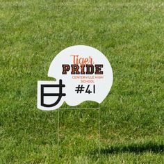 a sign in the grass that says eagle pride centerville high