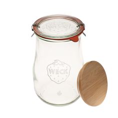 a glass jar with a wooden lid