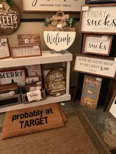 various signs and plaques on display in a store with the words, probably at target